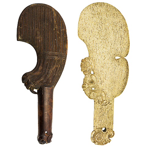 Carved wood and whale bone wahaika (hand clubs)